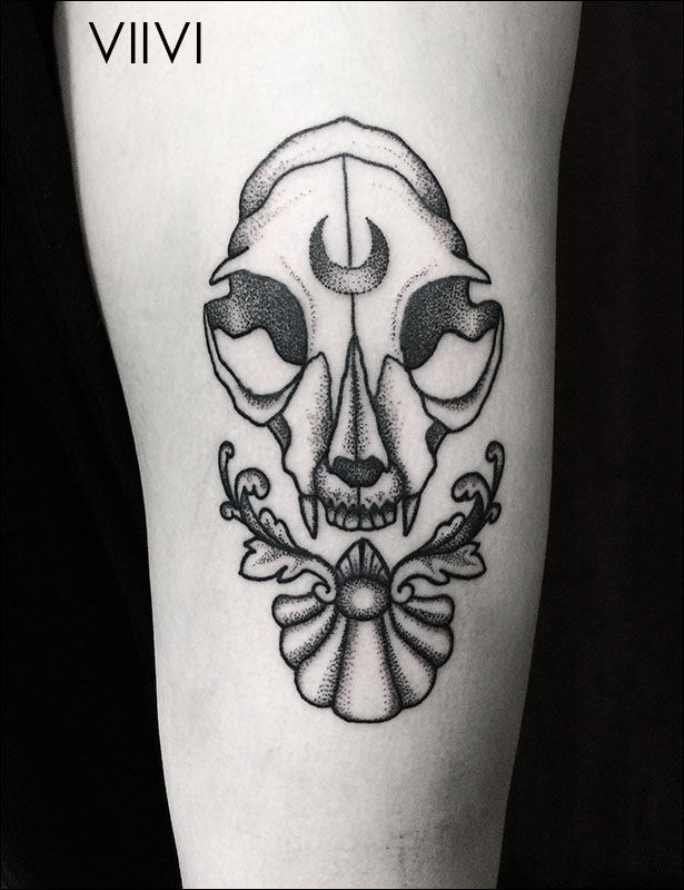 Kissa tatuointi