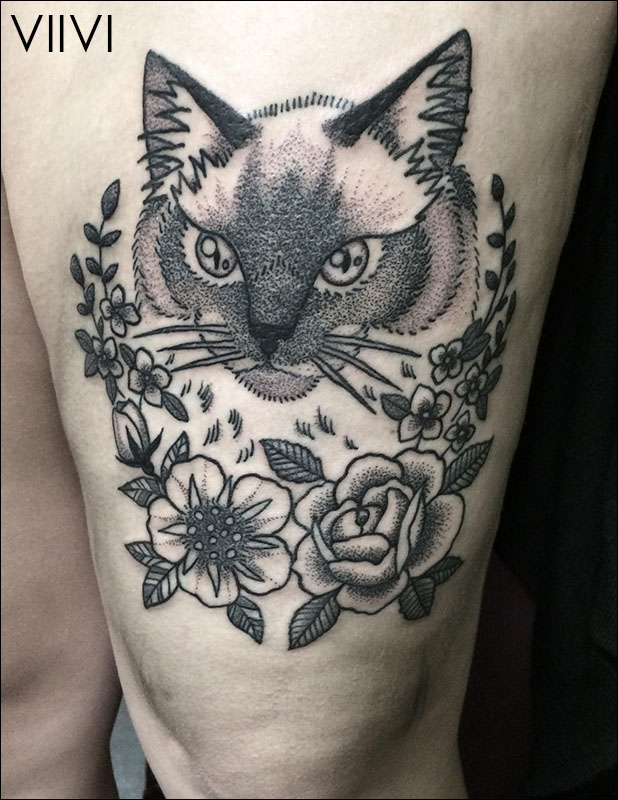 Kissa tatuointi