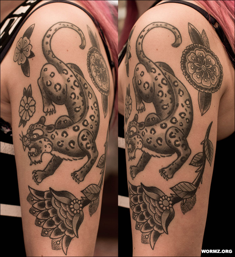Traditional leopard tattoo